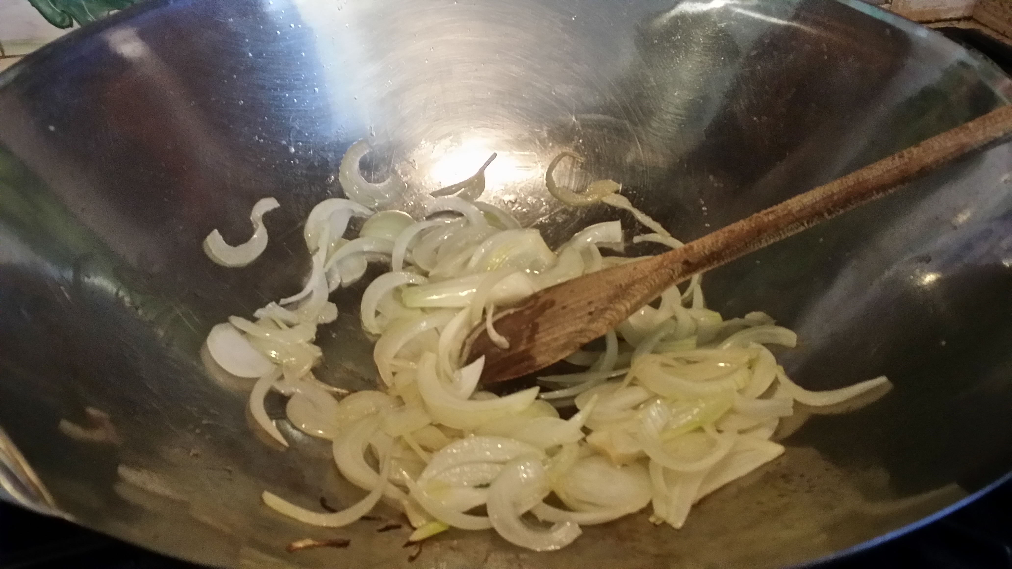 Cook Onions until Wilted in Coconut Oil