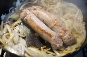 Smith Meadows sausages sauteing with onions